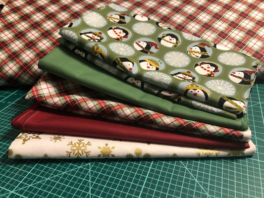 Green Jolly Penguin Fabric Bundle with coordinating fabrics also Sold By The Yard