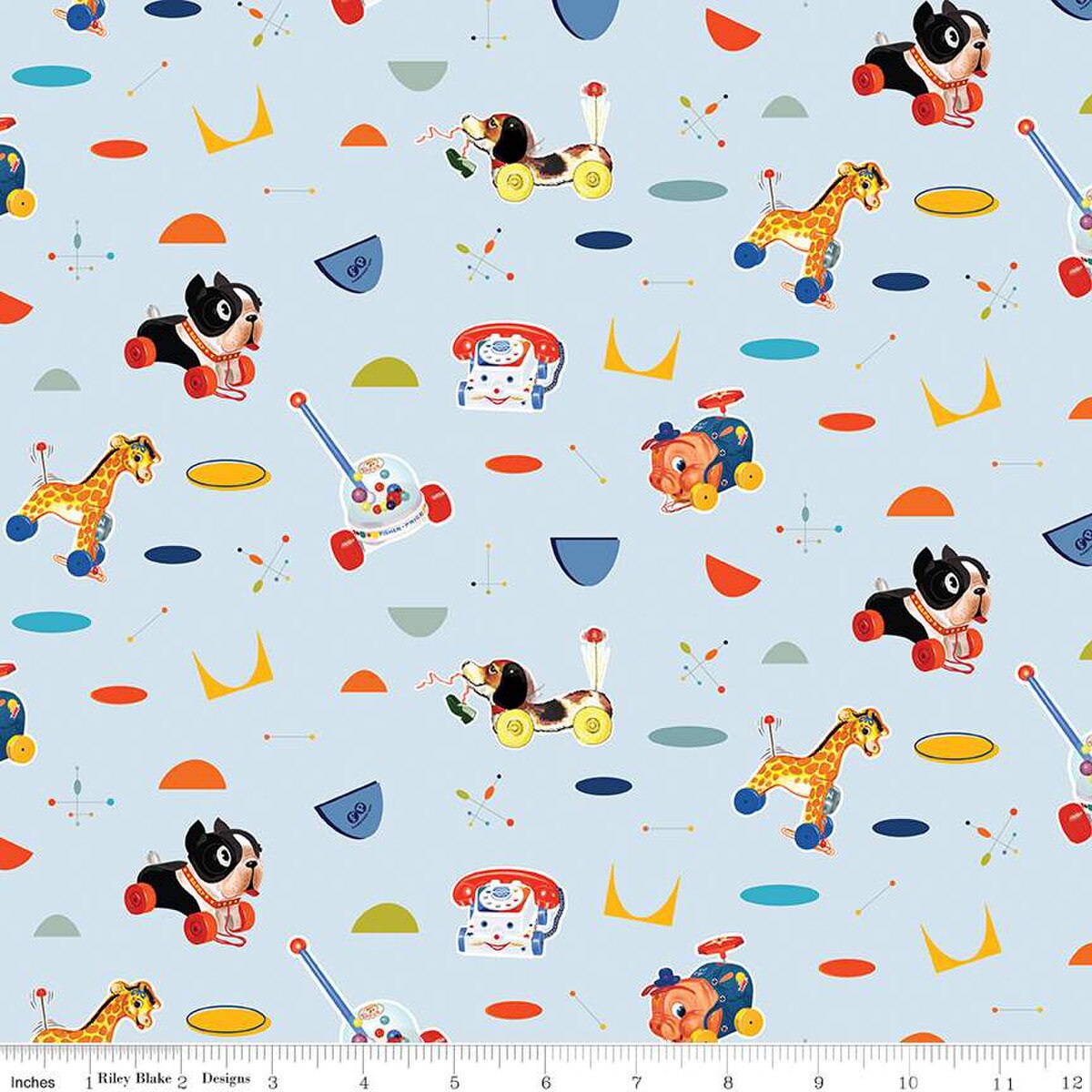 A fabric featuring colorful geometric designs and vintage Fisher-Price toy illustrations, such as a pull toy and stacking rings, on a blue background.