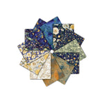A circular arrangement of twelve patterned fabric or paper swatches in various colors and designs, including floral, abstract, and textured prints, set against a plain white background.
